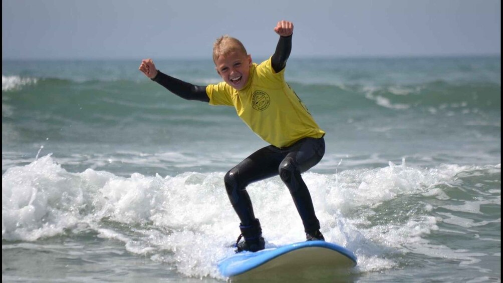 A person surfing on a wave. 1