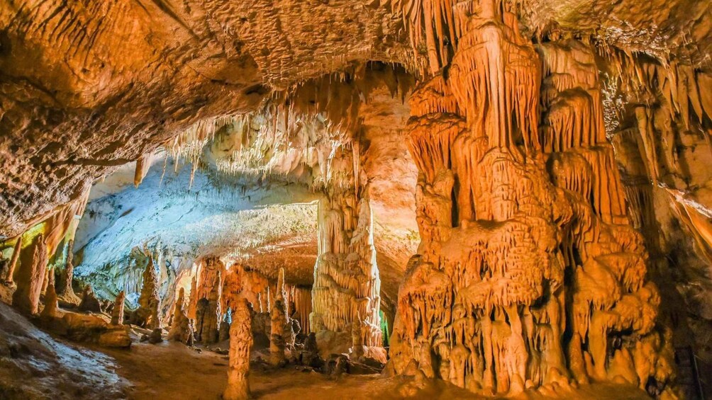 A cave with stalactites and stalagmites. 3