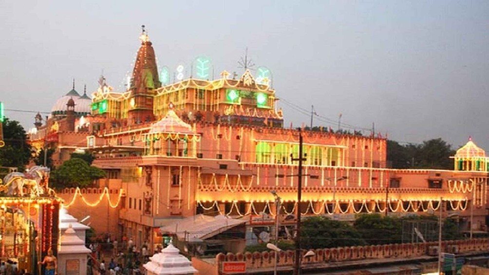 A temple complex with multiple domes and ornate structures. 5
