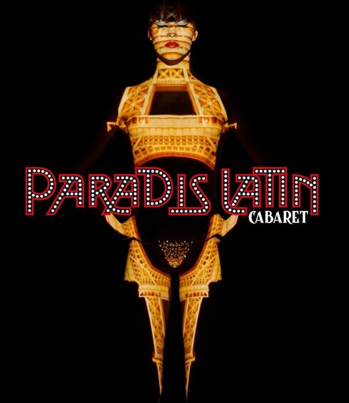 A person in a golden, patterned outfit with the text 'PARADIS LITIN CABARET' visible. 2