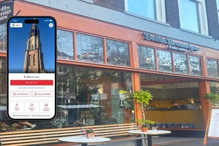 A restaurant named 'Delight Brown's' with outdoor seating and a smartphone displaying a map. 1