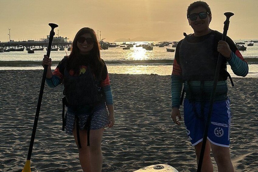 Paddle surfing experience at sunset 2