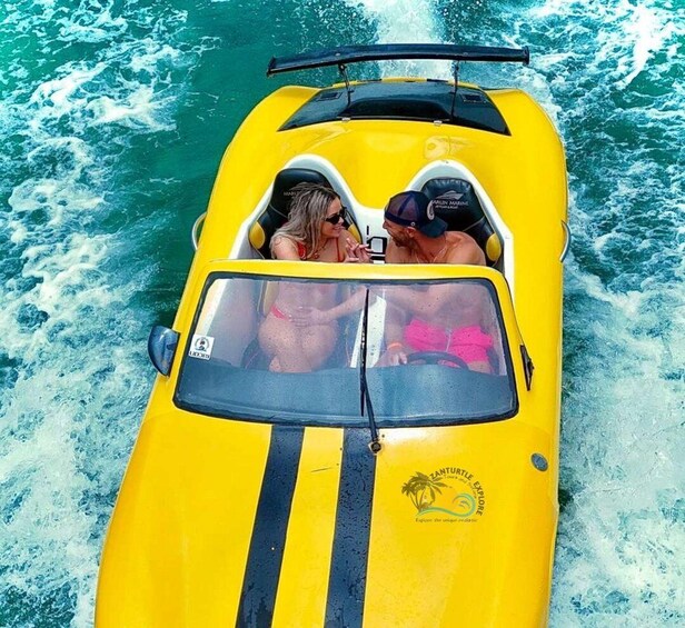 A yellow boat with two people, one in a bikini and the other in swimwear, on a body of water. 5