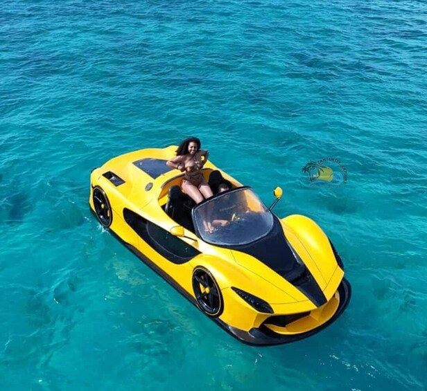 A yellow car-shaped boat on clear blue water. 2