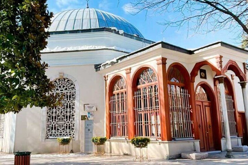 A building with a dome and arched windows. 2