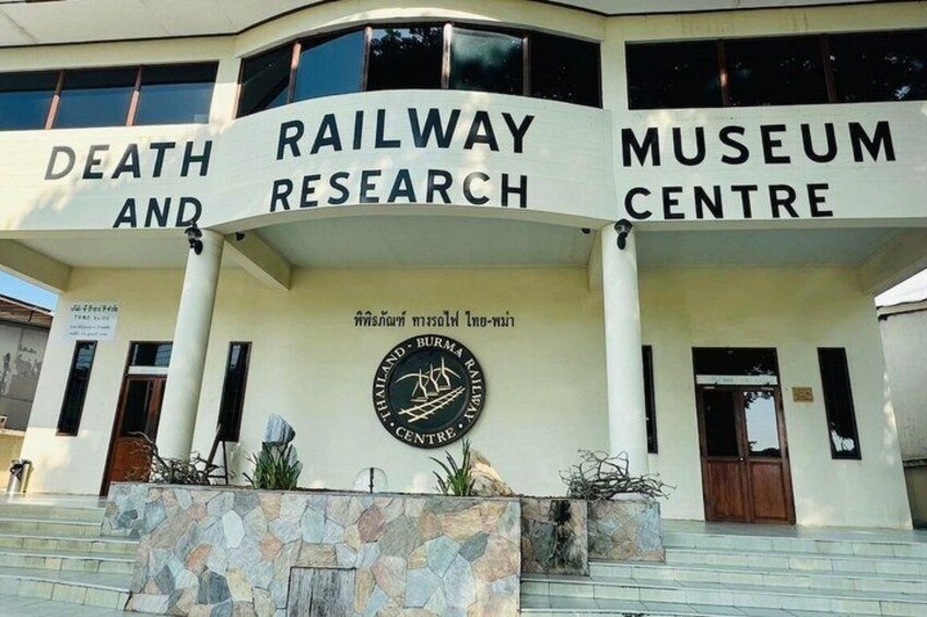 A building with signage reading 'Railway Research Centre' and 'Death and Museum Centre.' 4