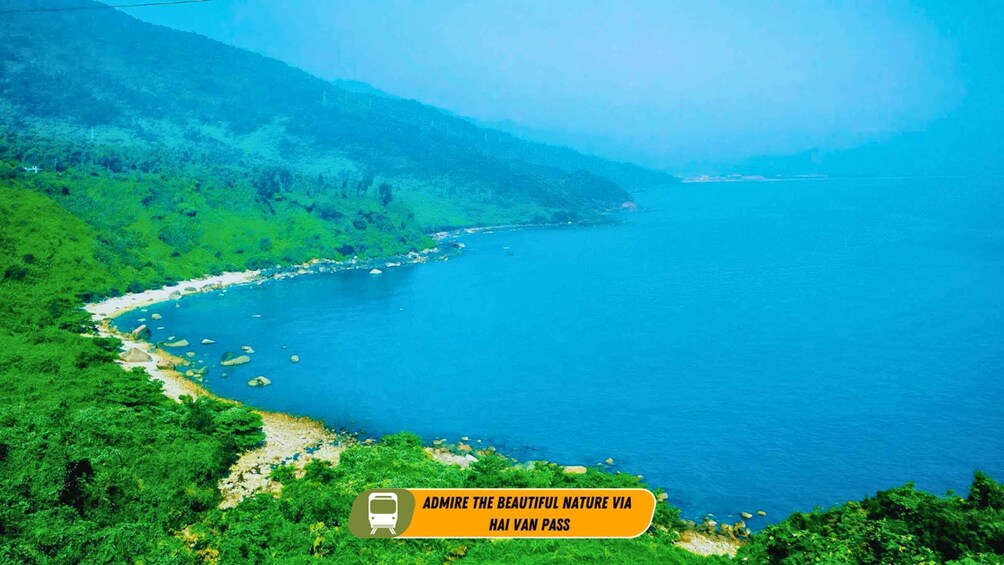 A coastal landscape with lush greenery and a clear blue sea. 5