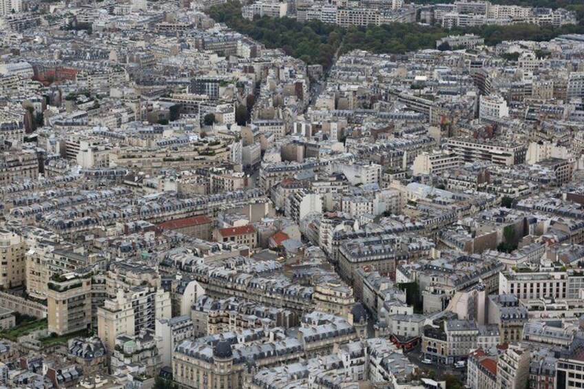A densely packed urban area with numerous buildings and streets. 4