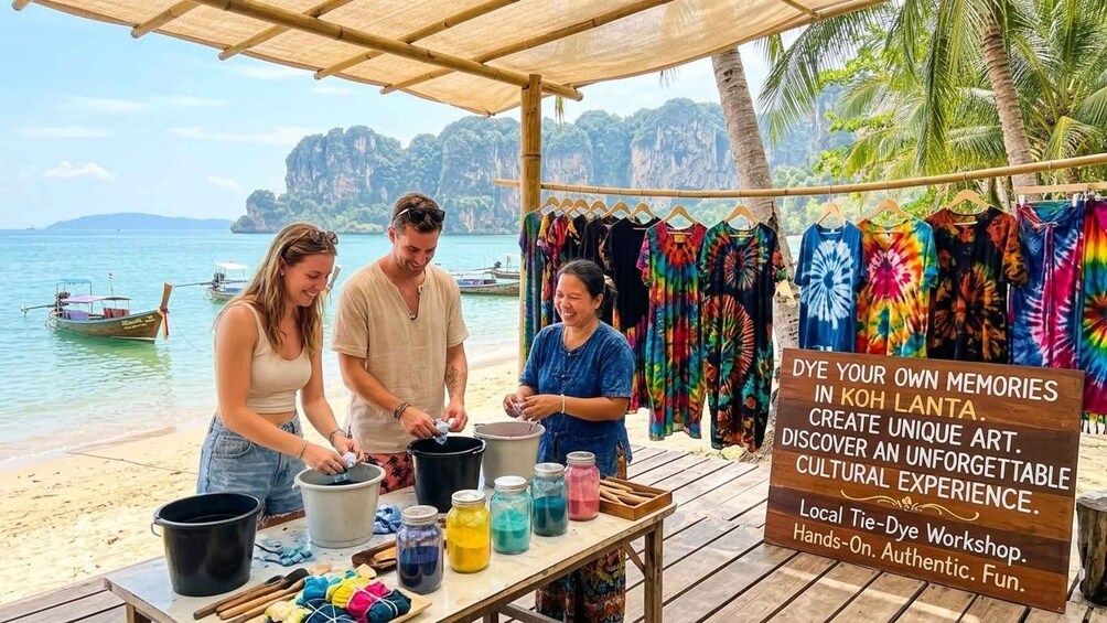 A beachside tie-dye workshop with participants preparing fabric. 3