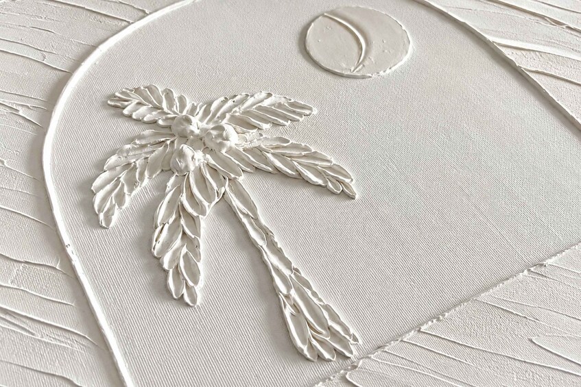 A textured surface with a palm tree design. 4