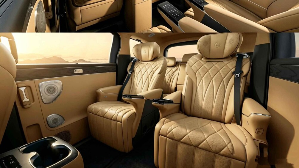 A luxury vehicle interior with beige leather seats, a sunroof, and a central console. 2