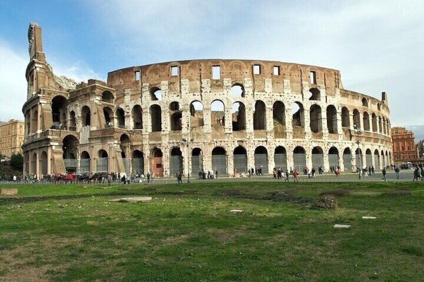 The Colosseum in Rome with its arches and ruins. 1