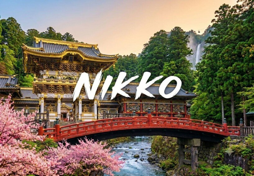 A traditional Japanese building, a red bridge, and a waterfall. 1
