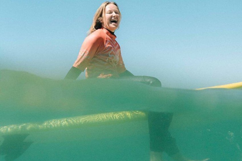 A person surfing on a wave. 4