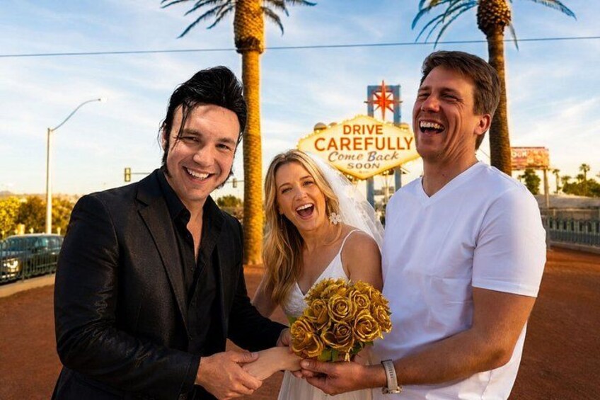 A wedding ceremony with a couple holding hands and a bouquet of yellow roses. 3