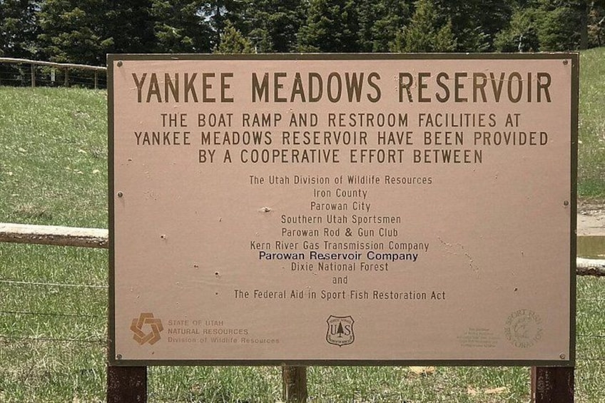 A sign at Yankee Meadows Reservoir detailing the cooperative effort behind the boat ramp and restroom facilities. 3