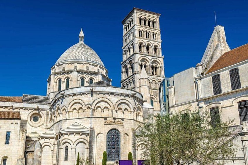 A historic church with a prominent dome and bell tower. 3