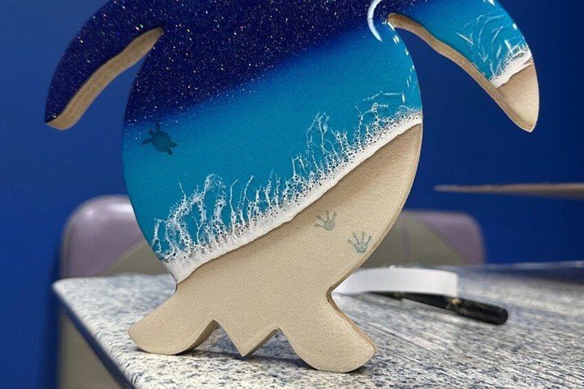 A decorative penguin with a blue and white gradient background, standing on a textured surface. 4