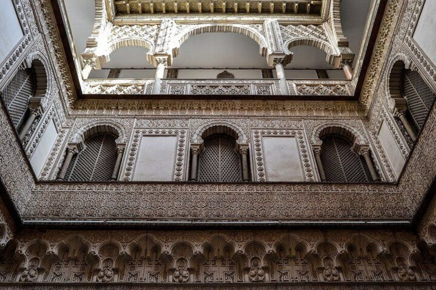 An ornate architectural detail with arches and intricate carvings. 3