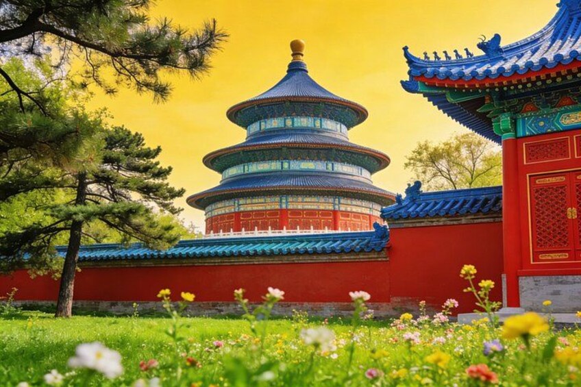 A traditional Chinese pagoda with a red and blue roof, surrounded by a grassy area with flowers. 4
