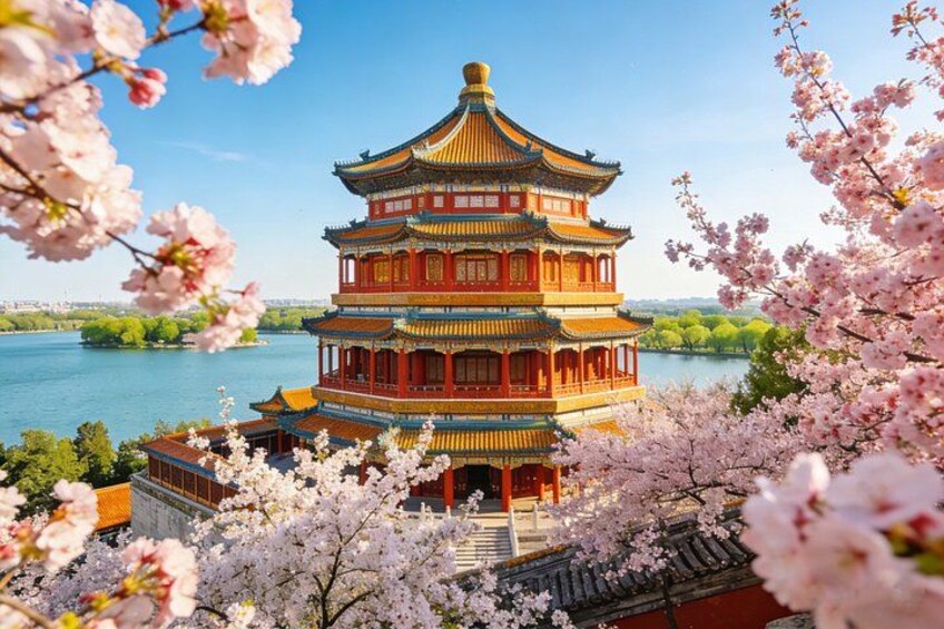A traditional multi-tiered pagoda surrounded by cherry blossoms and a body of water. 2