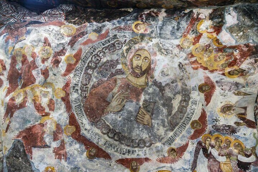 A mosaic with religious figures and inscriptions. 1
