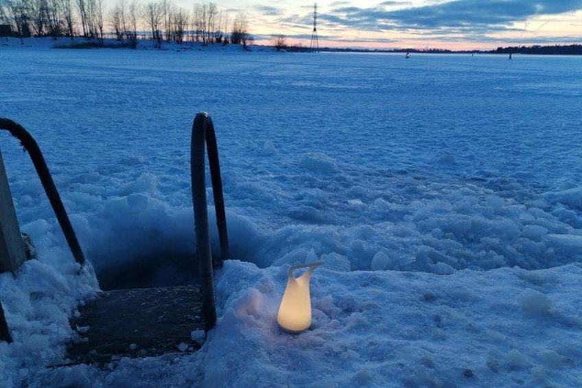 A frozen landscape with a chair and a light source. 3