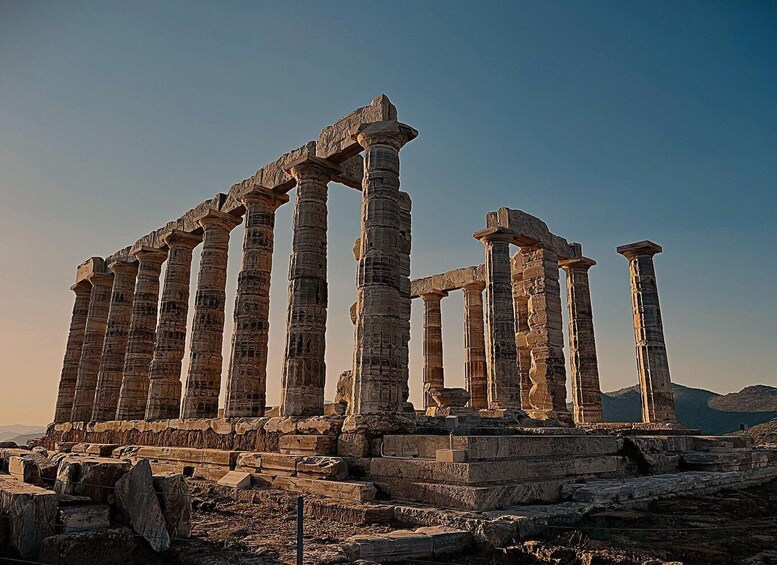 Ancient Greek ruins with columns and stone blocks. 1