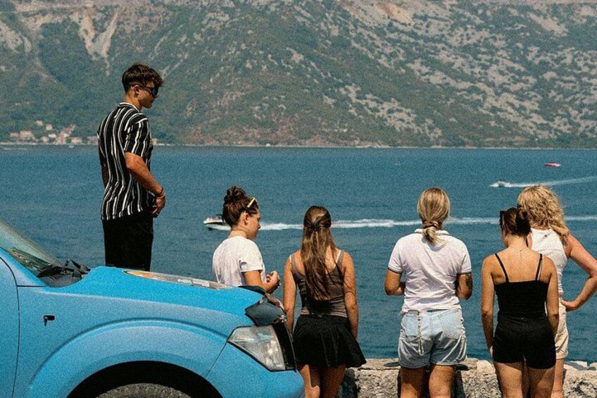 Jeep tour stop along the Bay of Kotor, where guests enjoy coastal mountain views and a relaxed small-group atmosphere. 3