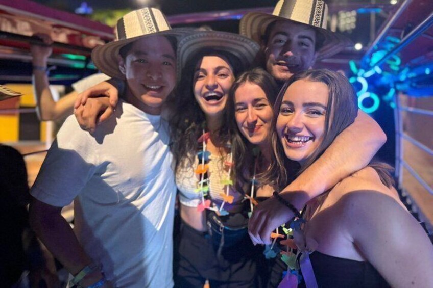 A group of people wearing hats and taking a selfie. 3