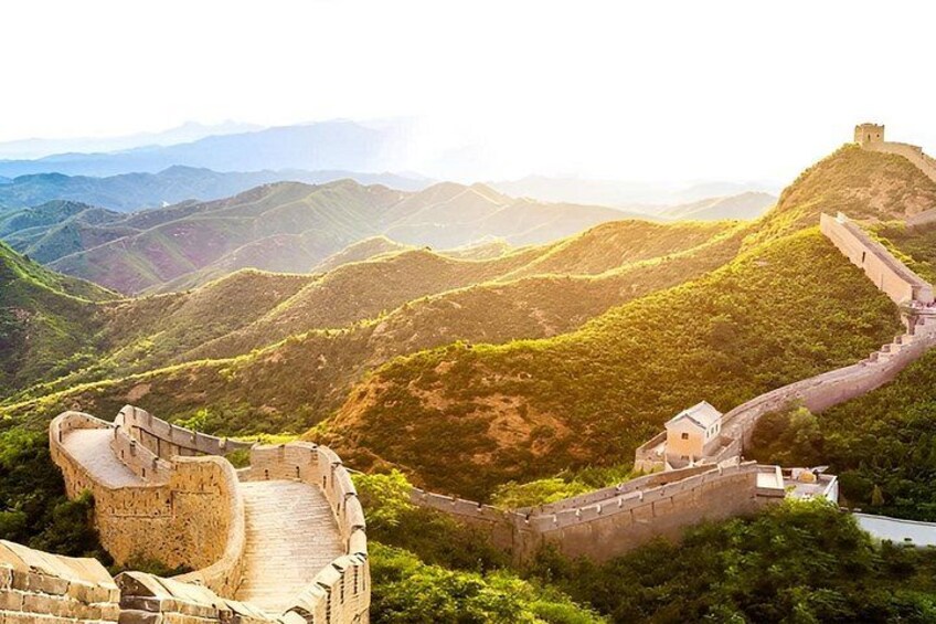 The Great Wall of China winding through mountainous terrain. 4