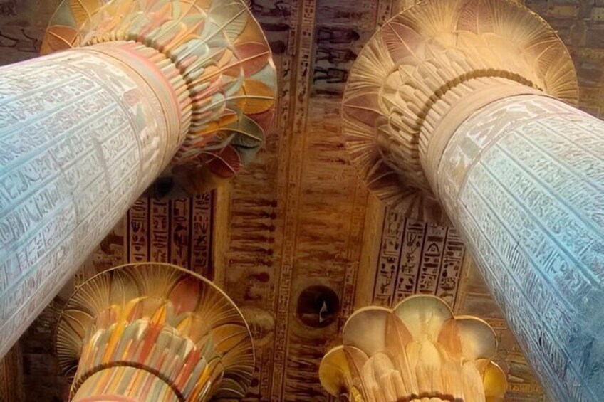 A close-up of intricately carved columns with hieroglyphics. 3