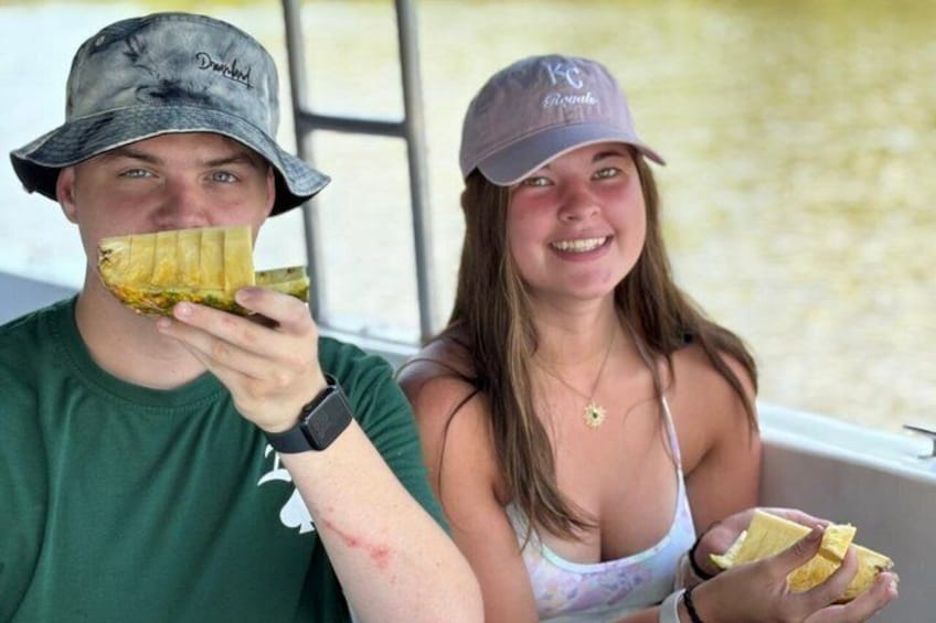 Two people eating sandwiches. 3