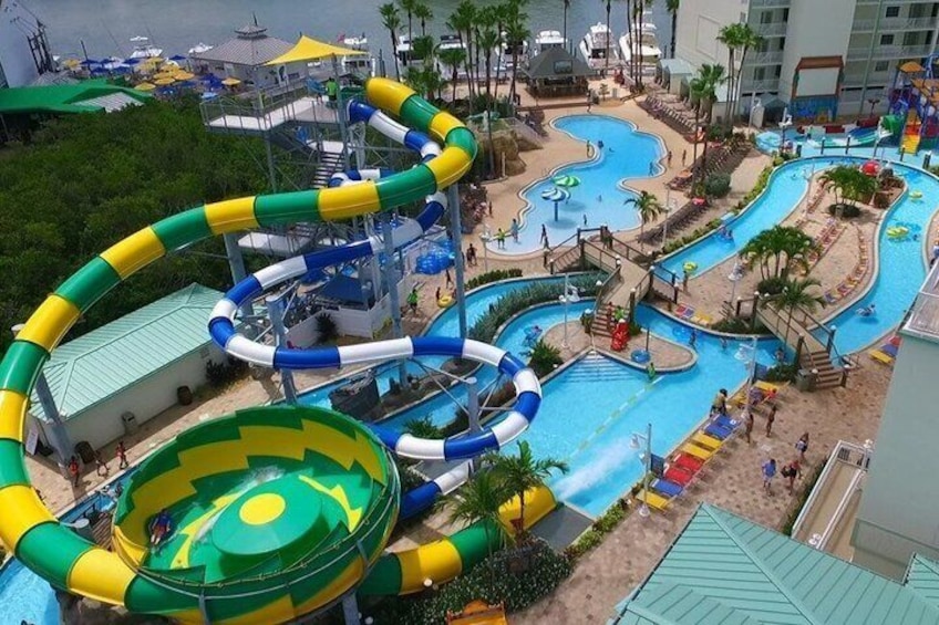 A water park with multiple slides and pools. 4