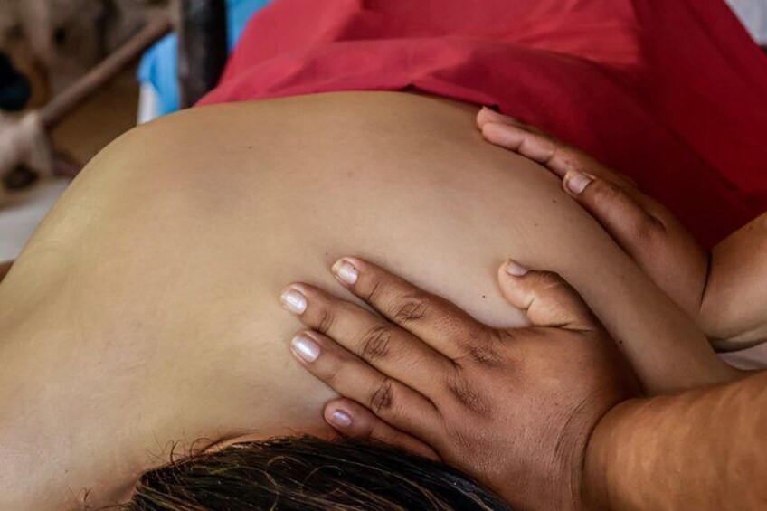 A person lying down with their head resting on a hand. 5