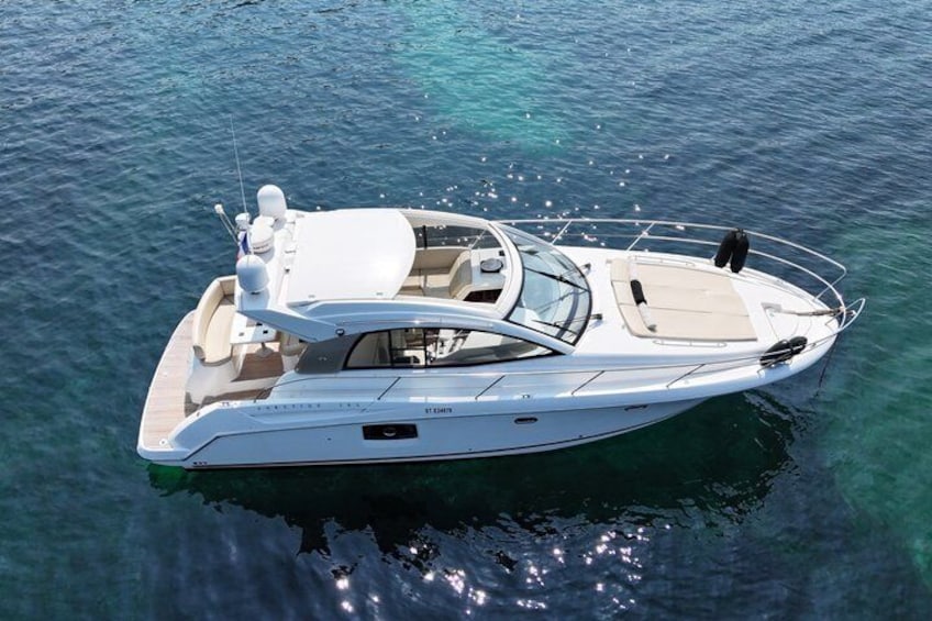 A white yacht on calm water. 1