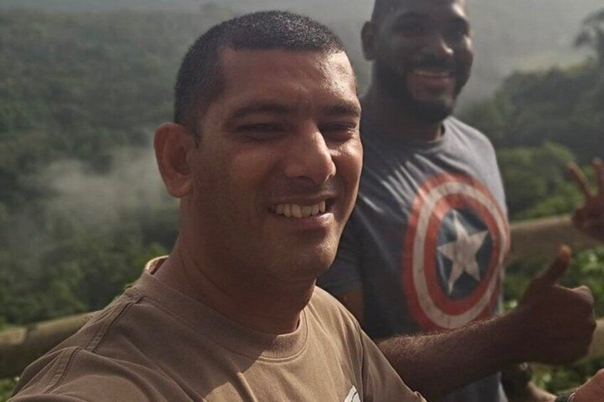 A person in a brown shirt and another in a Captain America t-shirt. 3