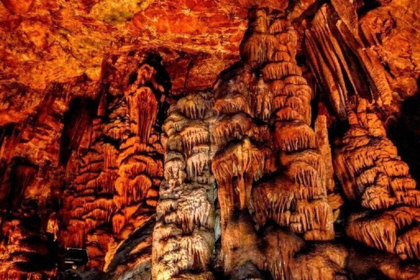 A cave with stalactites and stalagmites. 4
