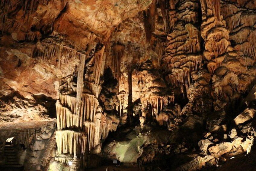 A cave with stalactites and stalagmites. 5
