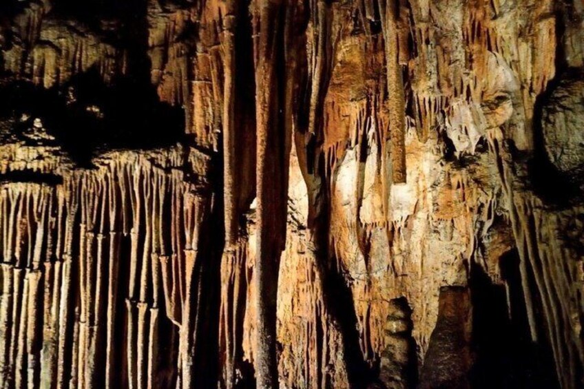 A cave with stalactites and stalagmites. 2