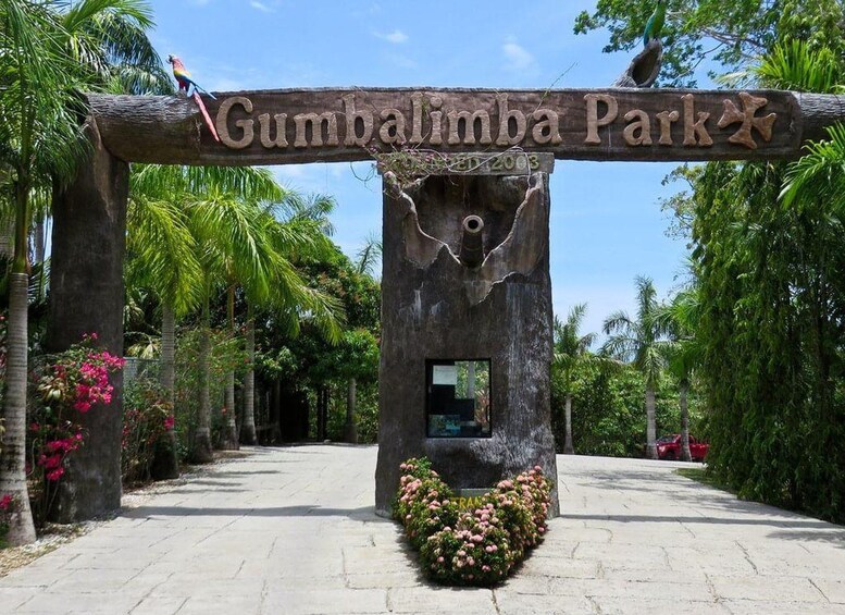 A wooden sign with the text 'Gumbalimba Park' and a date '2003' carved into it. 2