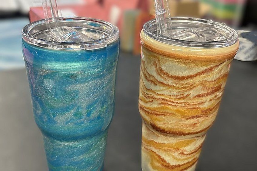 Two colorful drinks in glasses with straws. 4