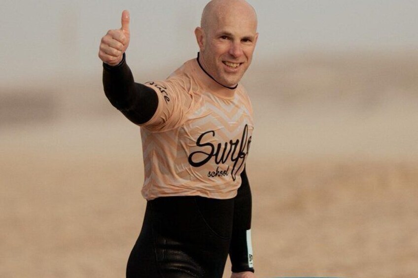 A person giving a thumbs-up gesture. 4