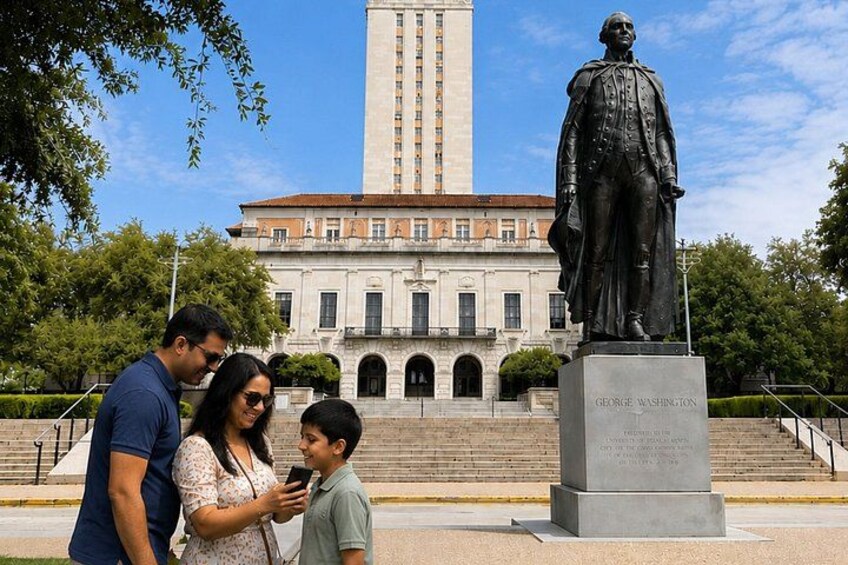 A family standing in front of a statue, with a large building in the background. 1