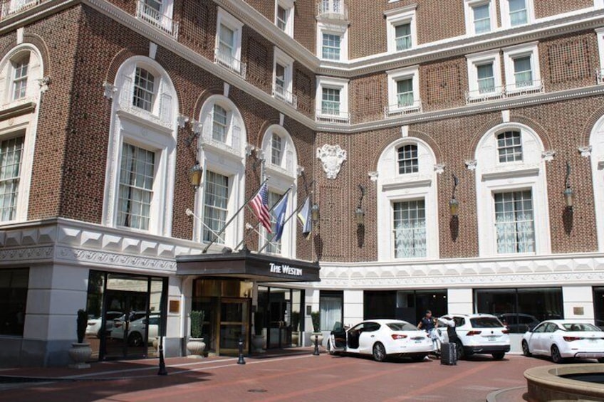 A brick building with a sign reading 'The Westin.' 4
