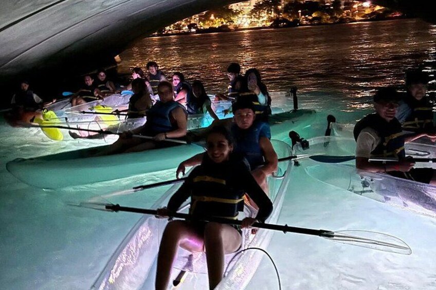 People rowing in a boat on a body of water. 5