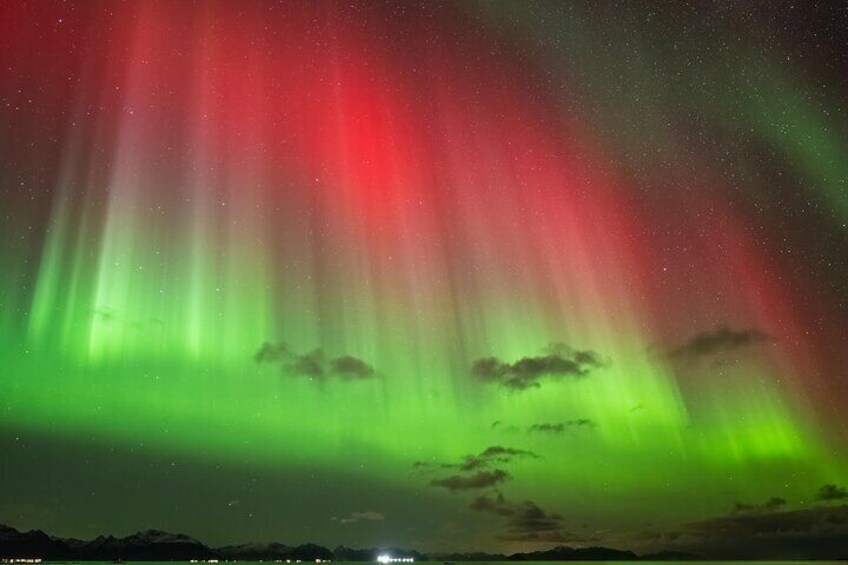 The aurora borealis over a mountainous landscape. 4