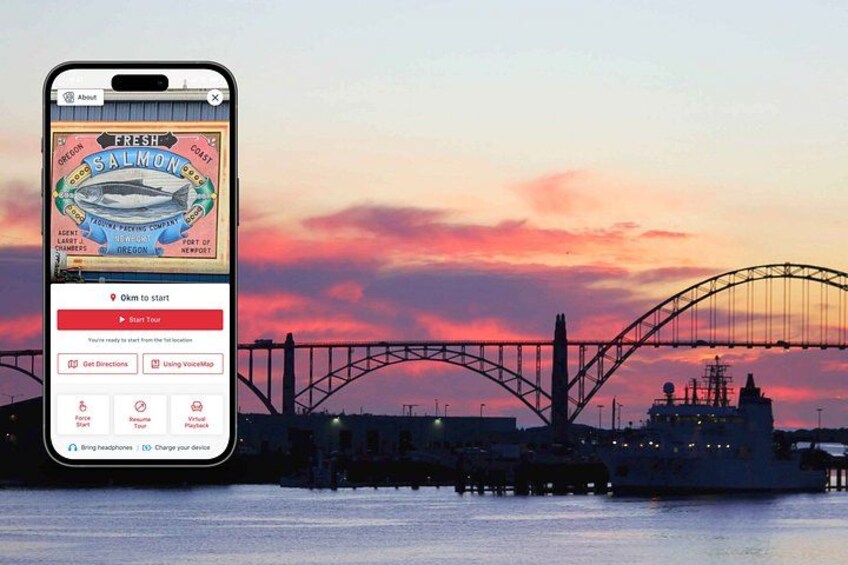 A smartphone displaying a fishing app with a scenic sunset and a bridge in the background. 1