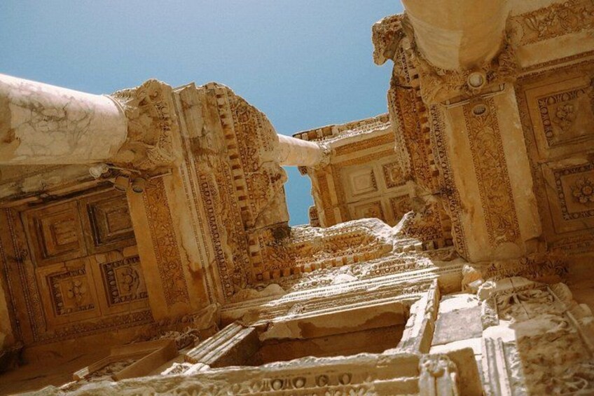Ancient ruins with intricate carvings and columns. 3