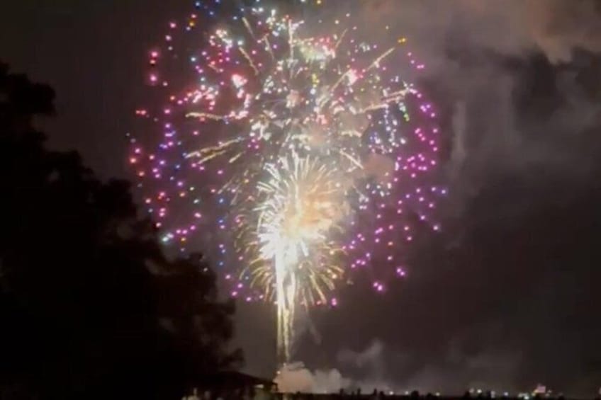 A night sky with a firework display. 1